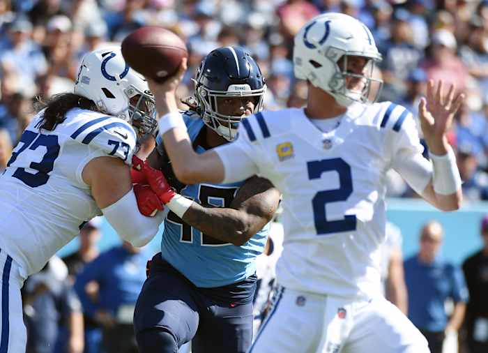 Oct 23, 2022; Nashville, Tennessee, USA; Tennessee Titans linebacker Bud Dupree (48) is blocked by Indianapolis Colts offensive tackle Dennis Kelly (73) as quarterback Matt Ryan (2) attempts a pass during the first half at Nissan Stadium.